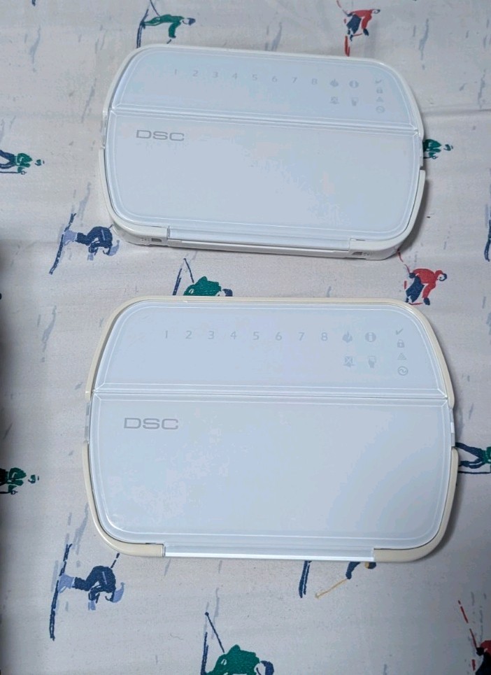 DSC PC1832 PowerSeries 8-32 Zone Alarm System Board with housing and keypads