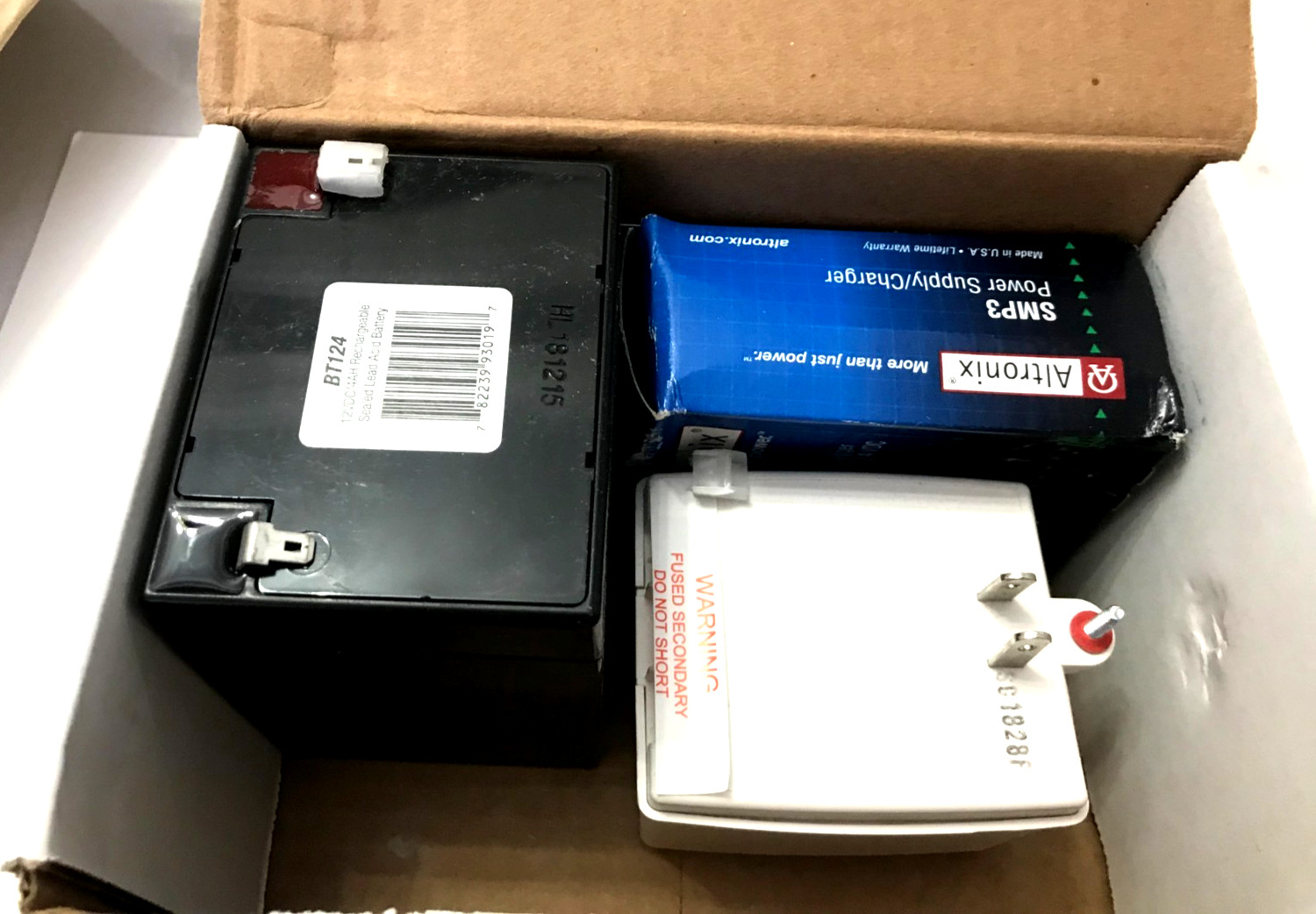 Altronix SMP312C Kit, 16.5VAC 40 plug In Transformer, 12VDC 4AH/W BATTERY