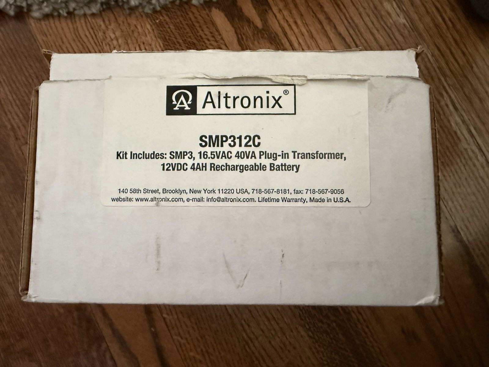 Altronix SMP312C Kit, 16.5VAC 40 plug In Transformer, 12VDC 4AH/W BATTERY