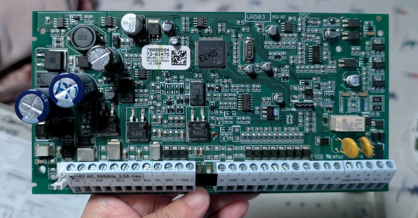 DSC PC1832 PowerSeries 8-32 Zone Alarm System Board with housing and keypads
