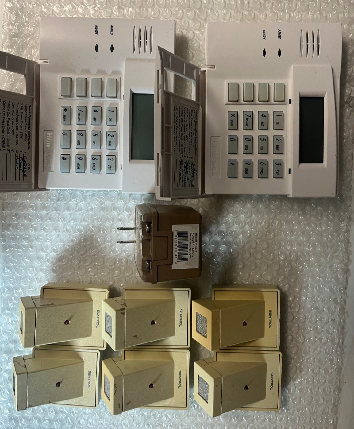 Ademco alarm system box, 2 keypads ,charger, and 6 glass break , parts only