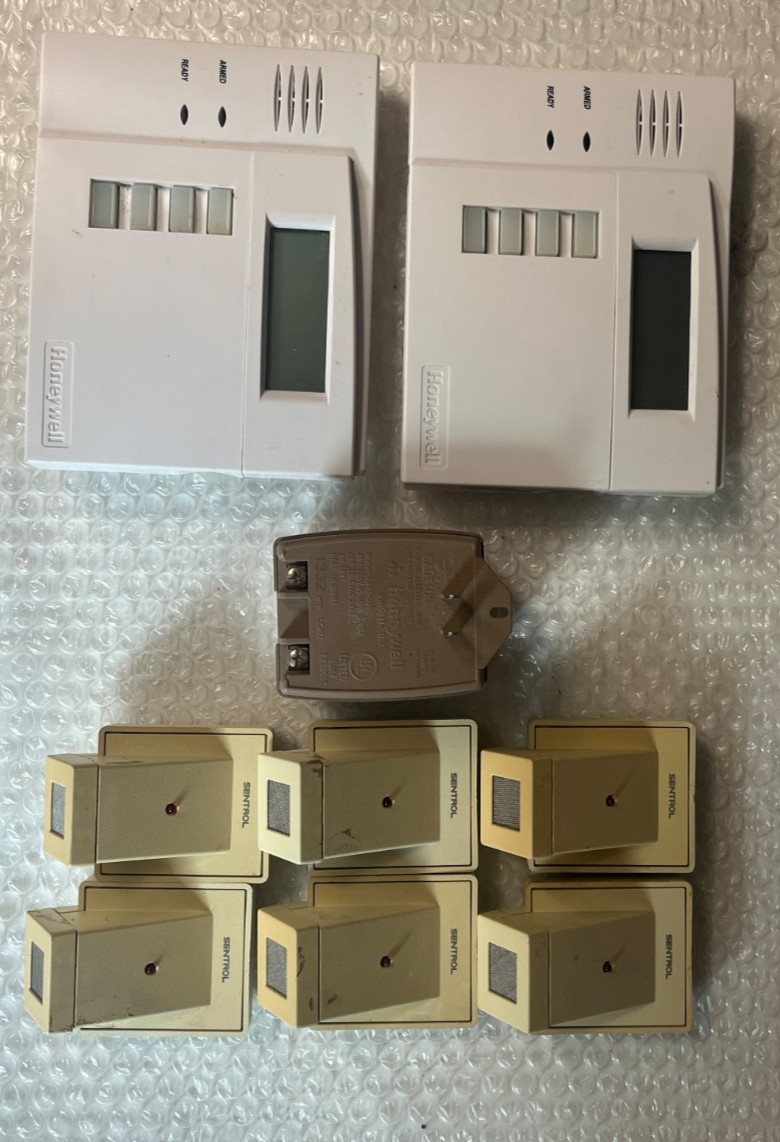 Ademco alarm system box, 2 keypads ,charger, and 6 glass break , parts only