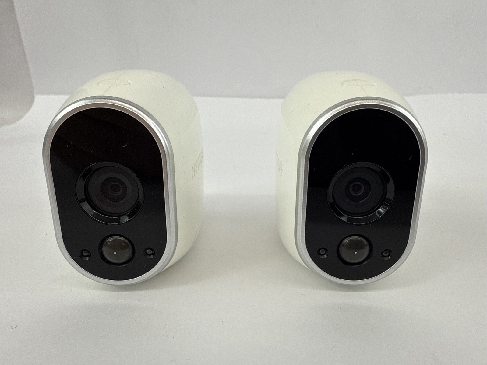 2 NETGEAR ARLO VMC3030 Indoor/Outdoor Security Cameras with Mounts Untested