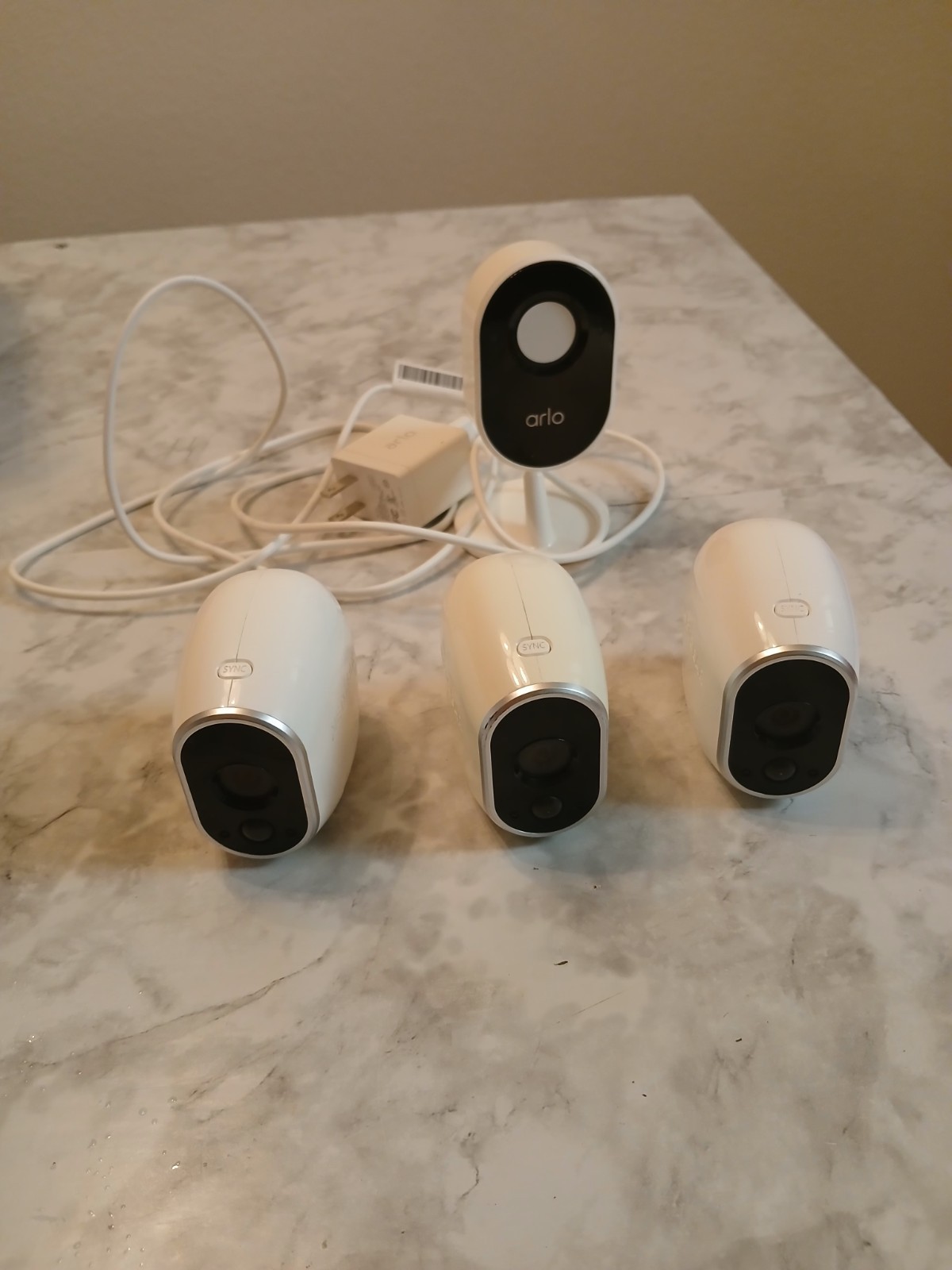 Arlo Essential Indoor Security Camera And Three Arlo Cameras Model VMC3030
