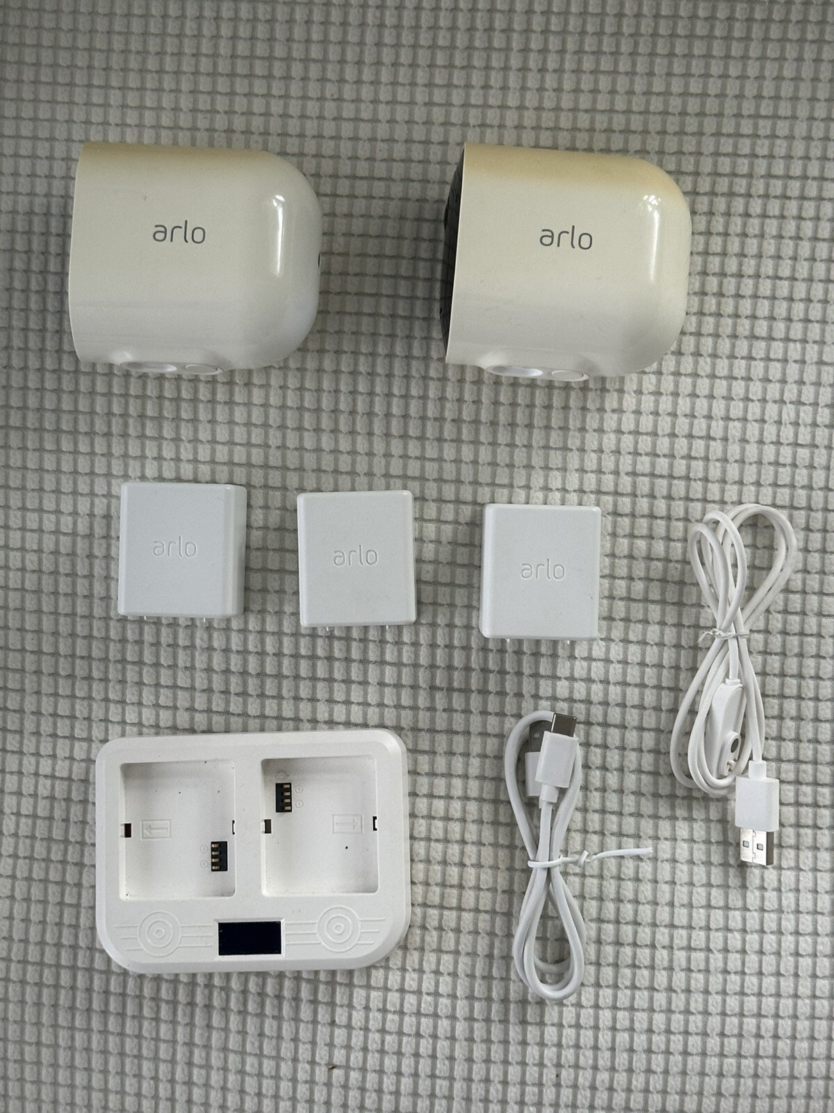 Arlo Surveillance Complete Kit(Base, Cameras, Batteries, Solar Panels, Chargers)