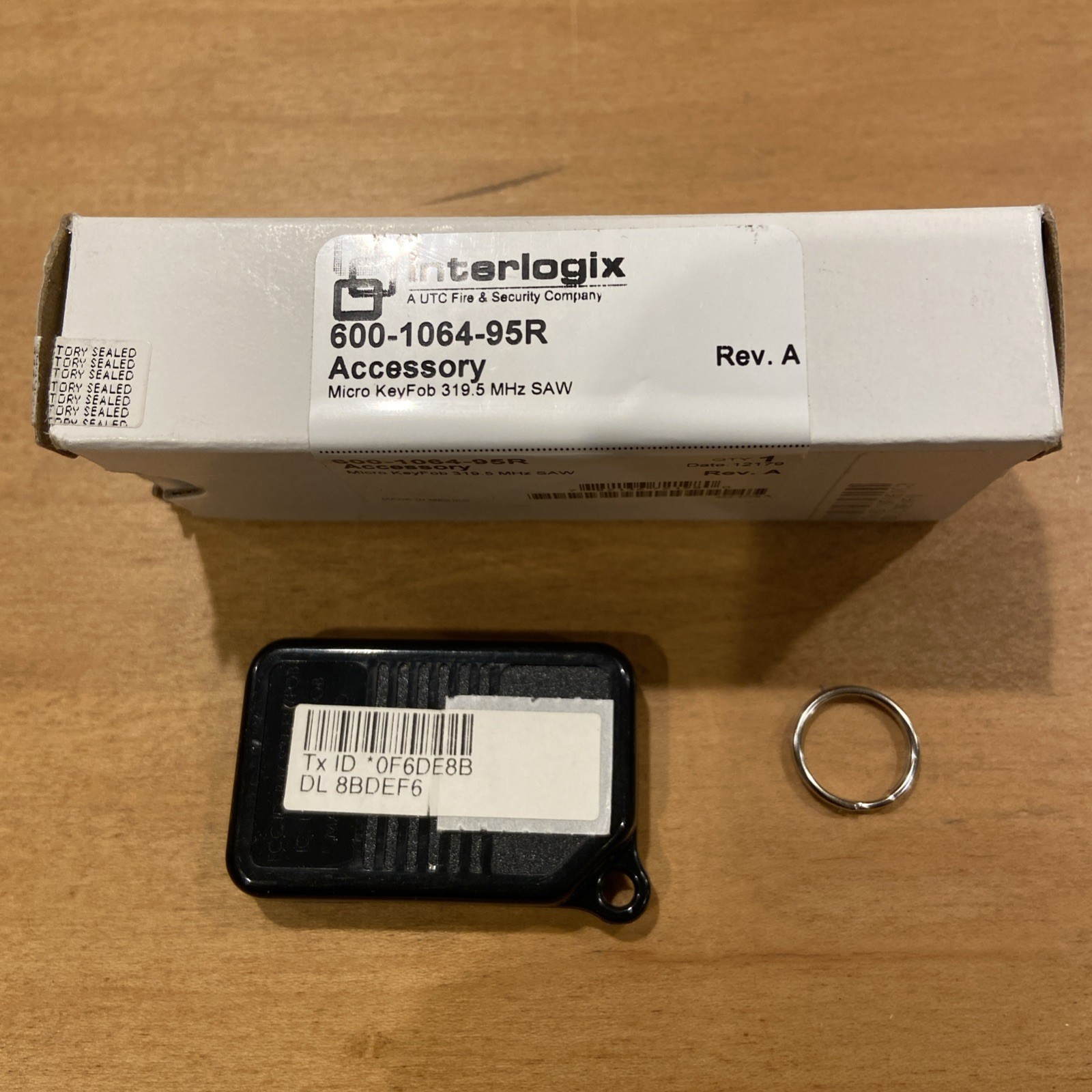 New GE Interlogix 600-1064-95R Four Button Wireless Remote Key-fob with Battery