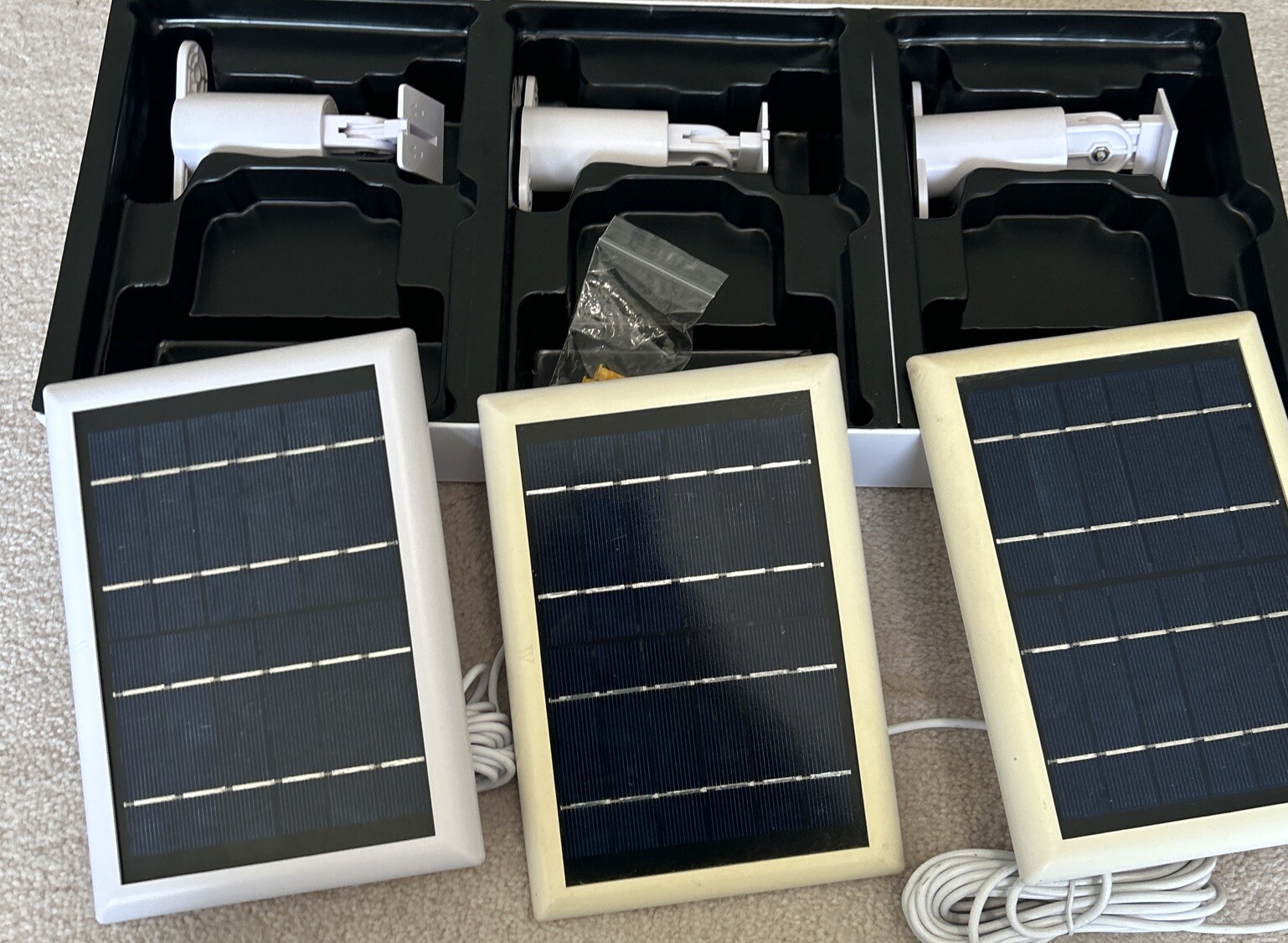 Arlo Pro 4 Spotlight Camera – White, Set of 3 with solar panel.