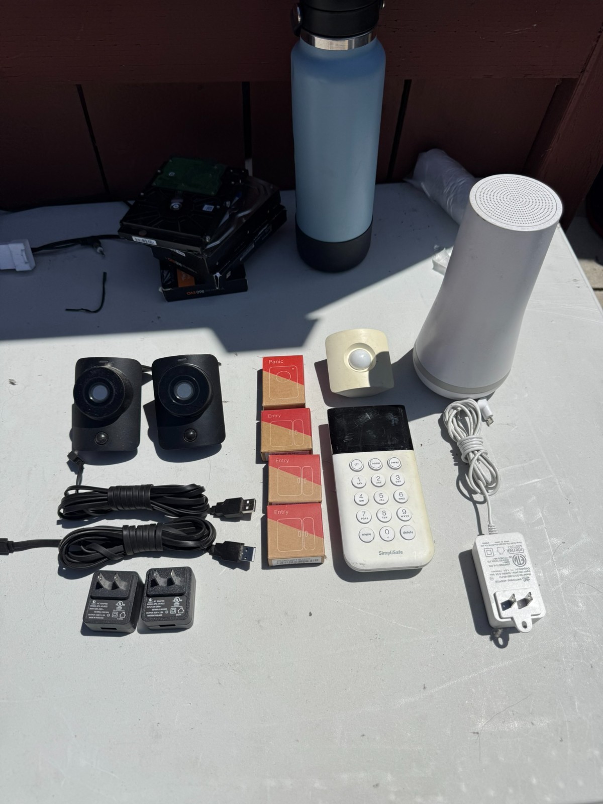 SimpliSafe system with base station, keypad, entry, motion sensors, panic button