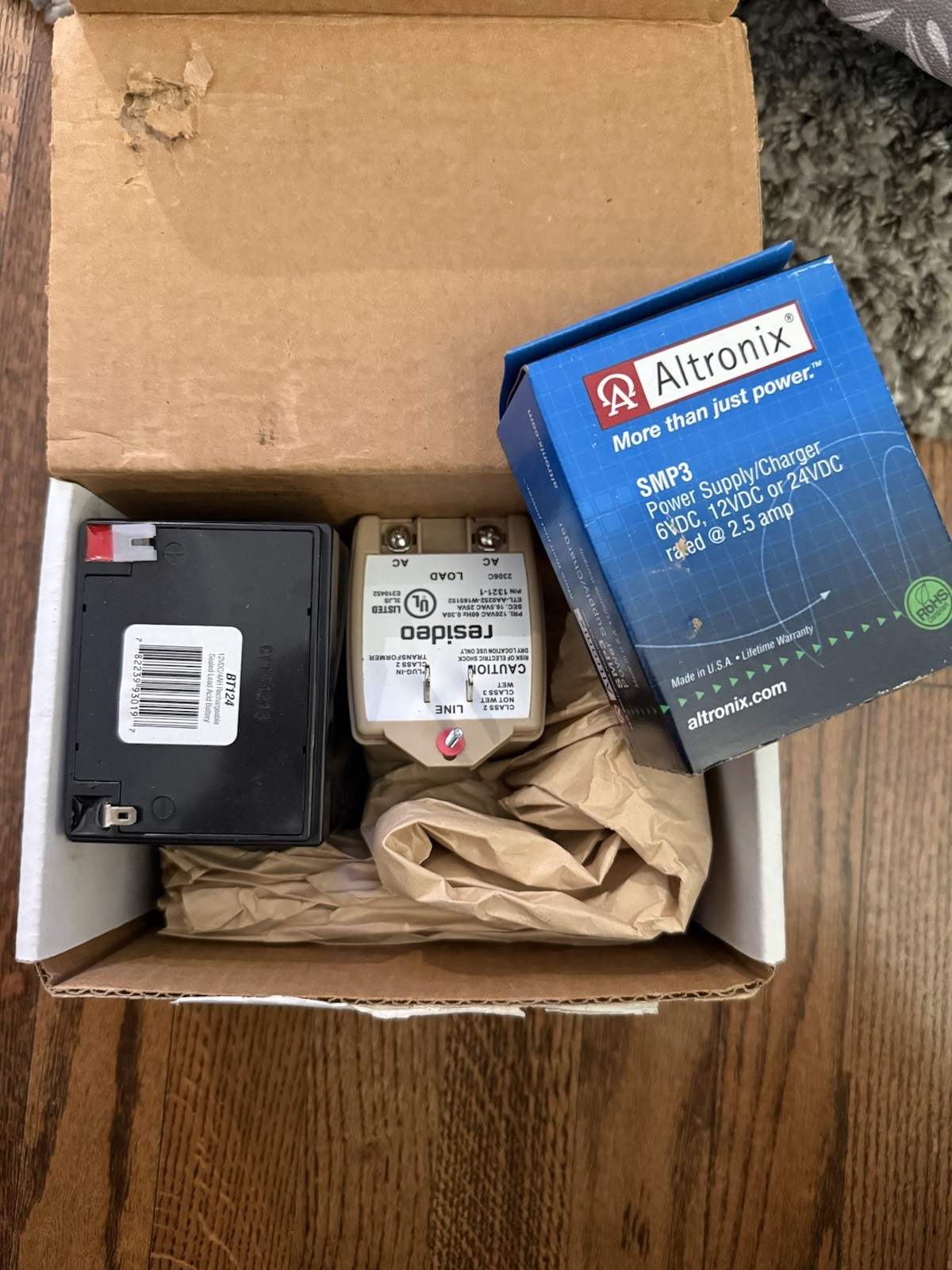Altronix SMP312C Kit, 16.5VAC 40 plug In Transformer, 12VDC 4AH/W BATTERY