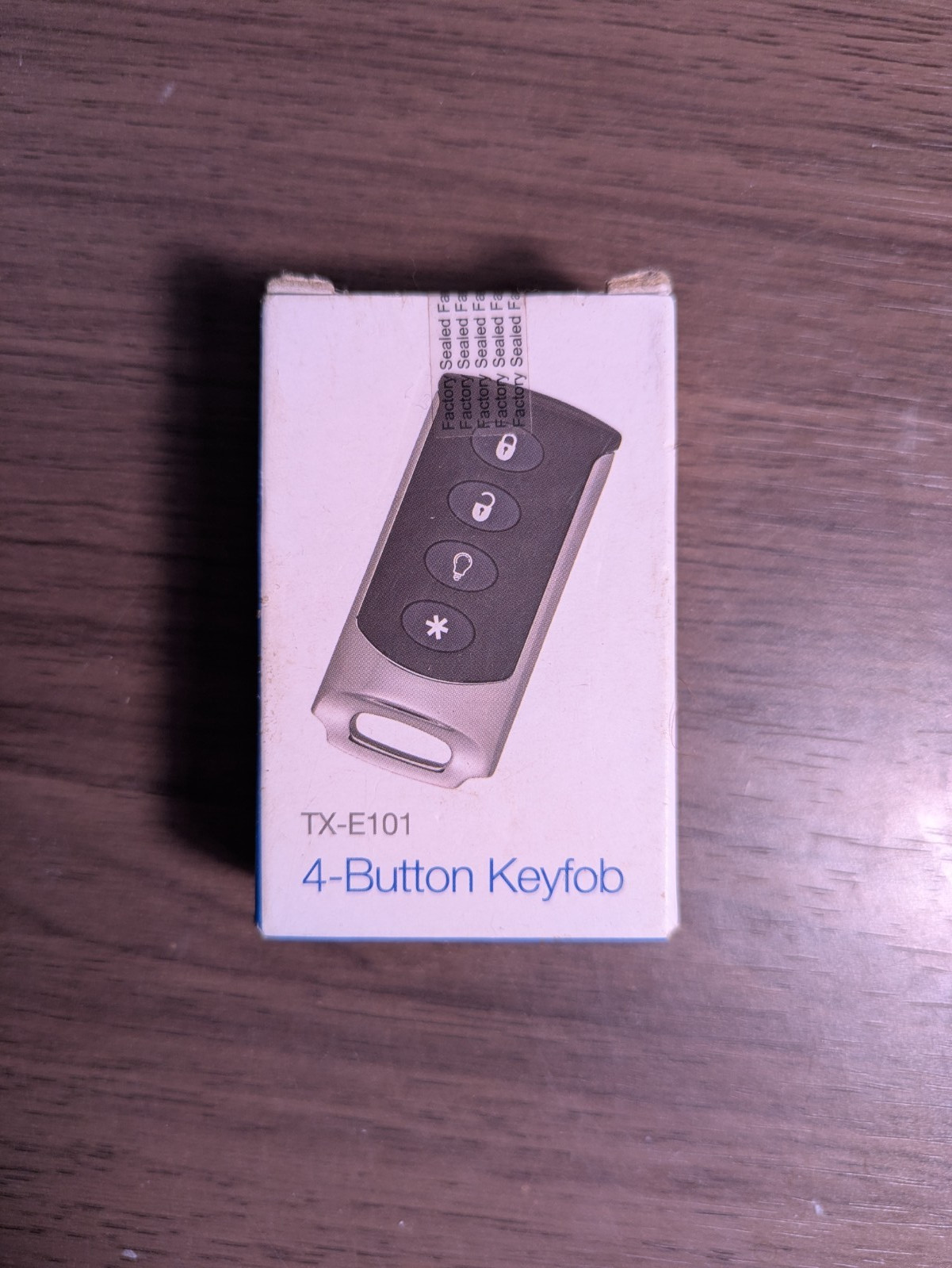 New – TX-E101 Interlogix 4-Button Keyfob for 319.5 Mhz