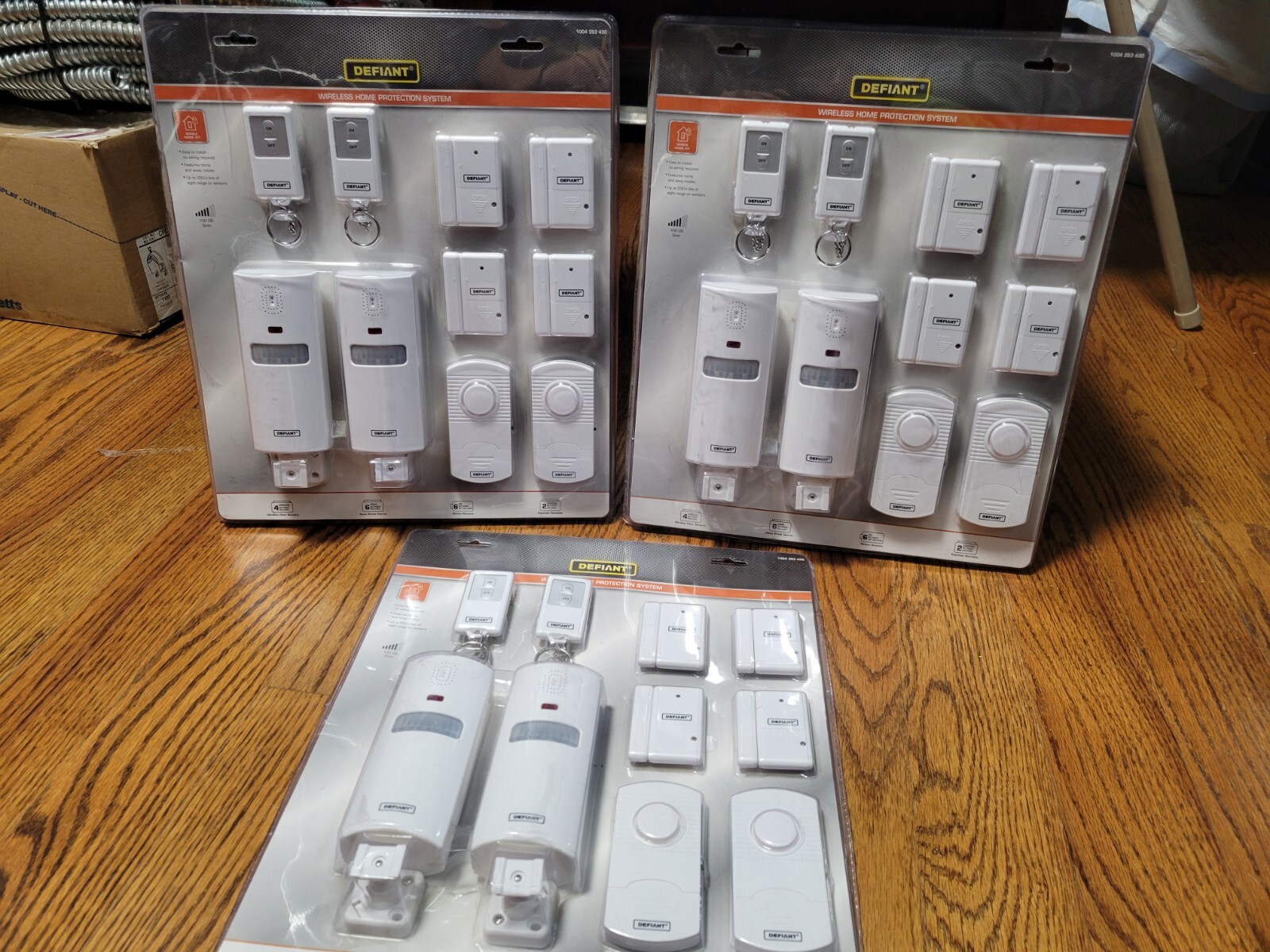 (1) New Defiant Wireless Home Protection System: 4 Window/door, 2 Motion, 2 Glas