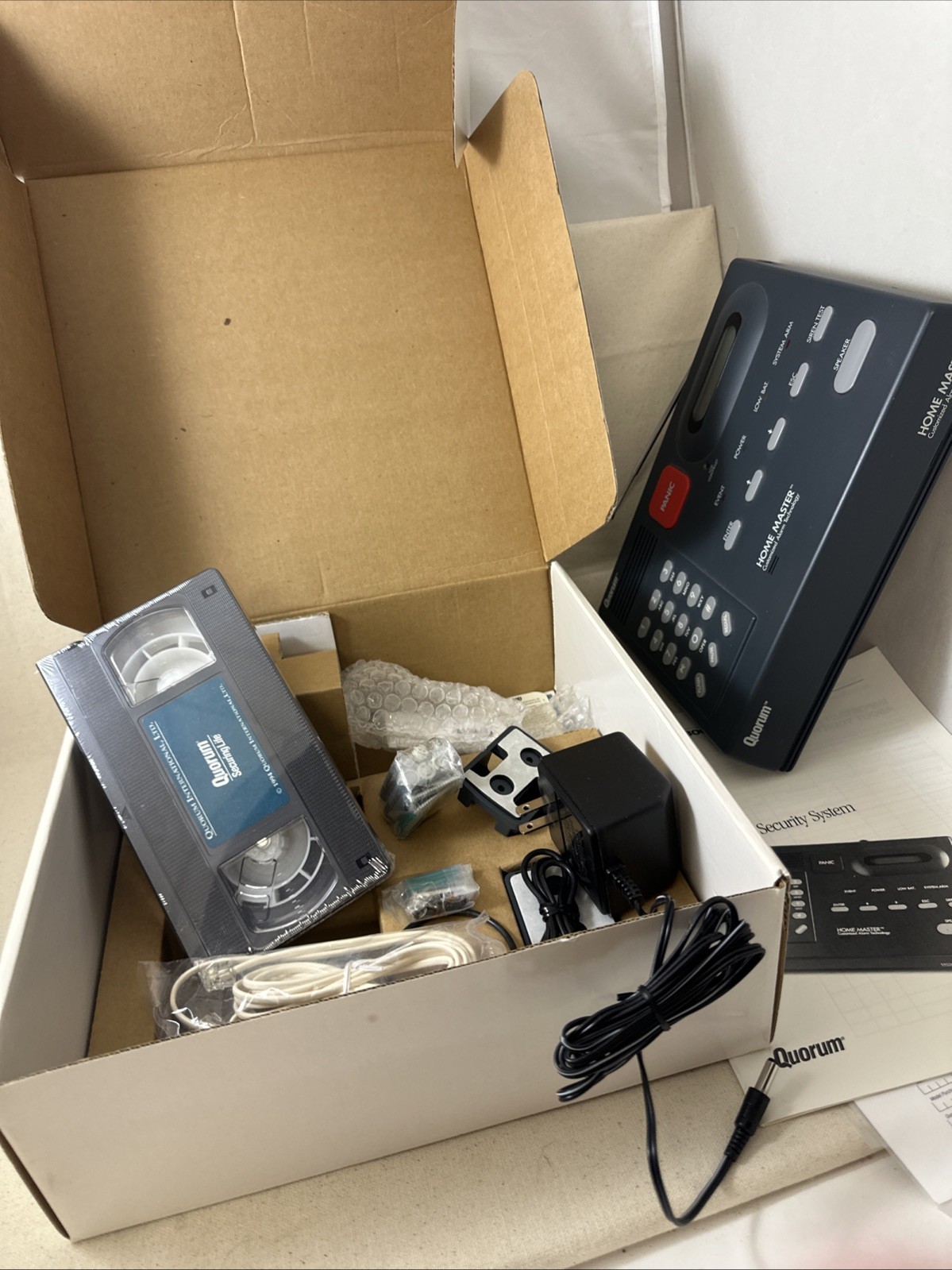 Quorum Home Master HM-100 Security System with remote , cassette , AC adapter