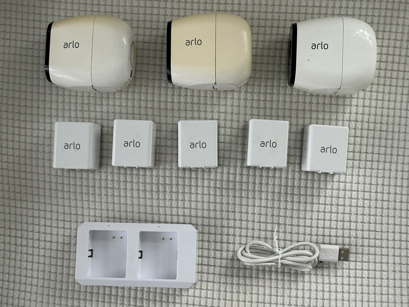 Arlo Surveillance Complete Kit(Base, Cameras, Batteries, Solar Panels, Chargers)