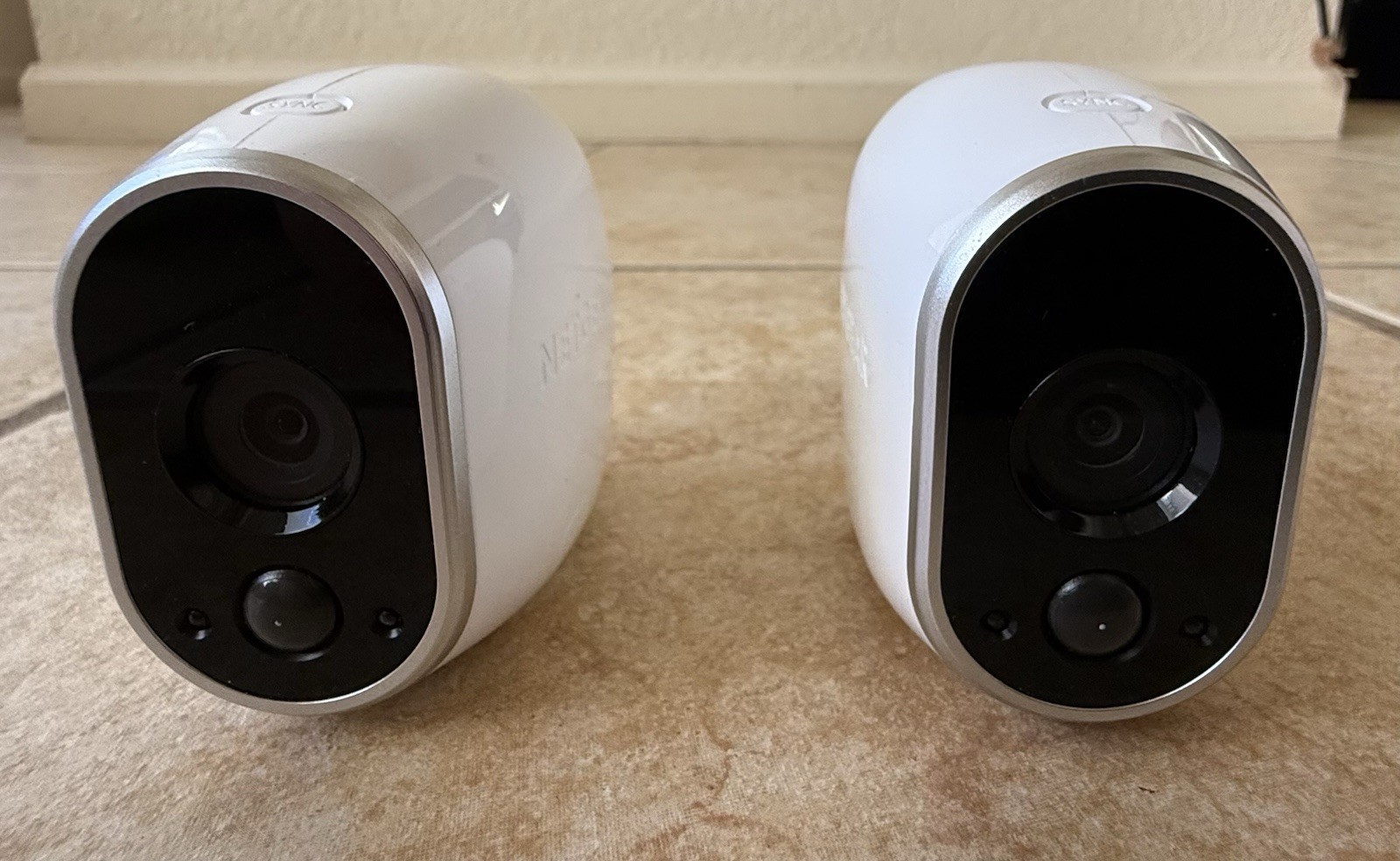 2 Netgear Arlo VMC3030 Indoor/Outdoor Security Cameras w/2 Magnet Mount & Wall