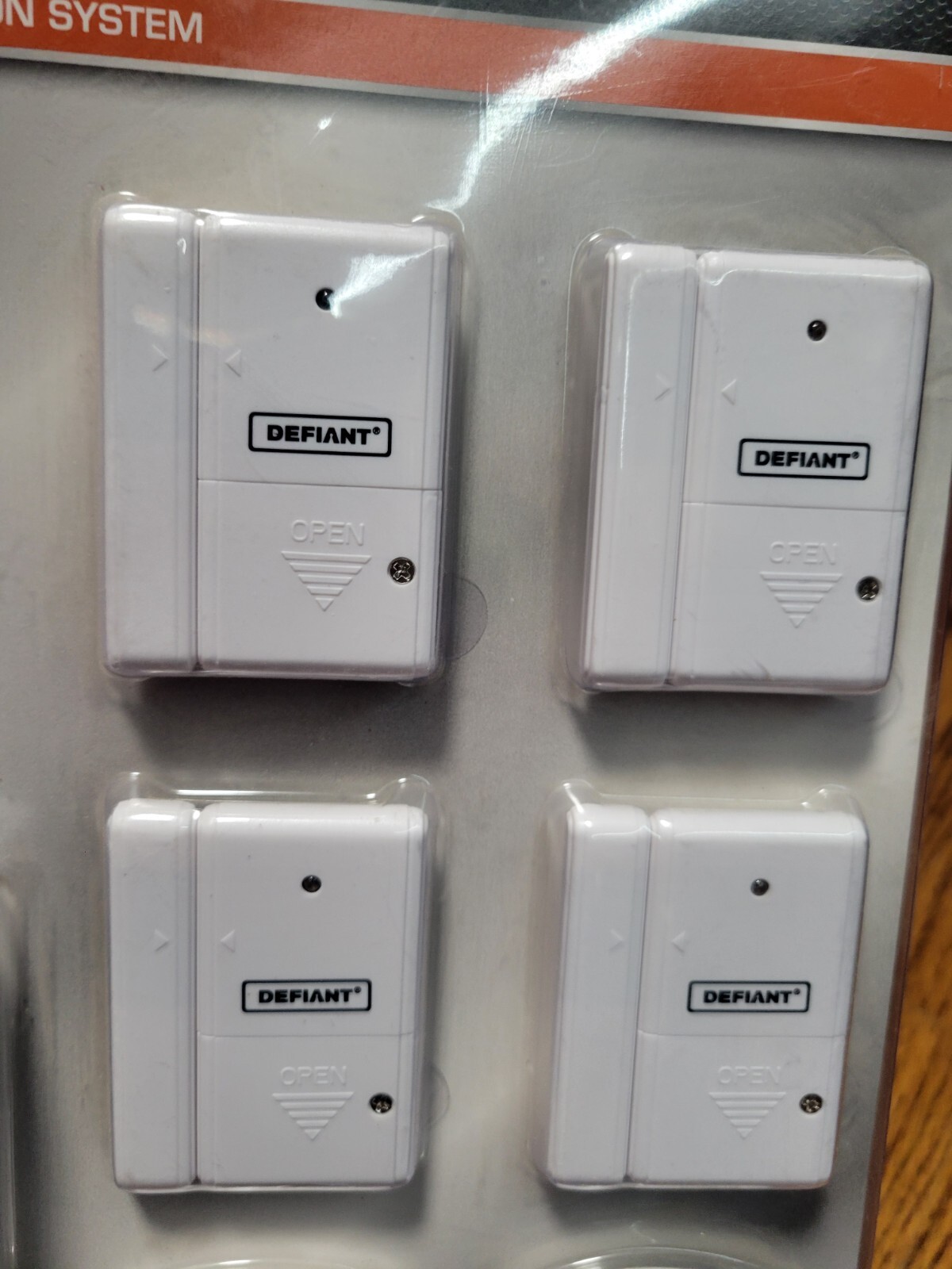 (1) New Defiant Wireless Home Protection System: 4 Window/door, 2 Motion, 2 Glas