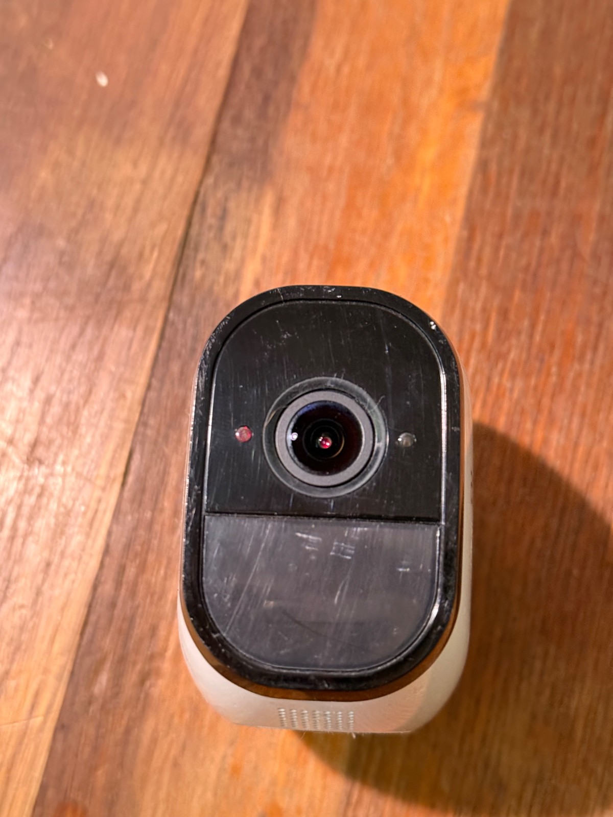 Arlo Pro VMB4000 base station, one Arlo Pro Camera, cables and camera mount.
