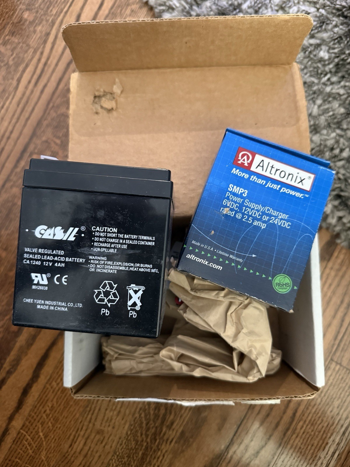 Altronix SMP312C Kit, 16.5VAC 40 plug In Transformer, 12VDC 4AH/W BATTERY