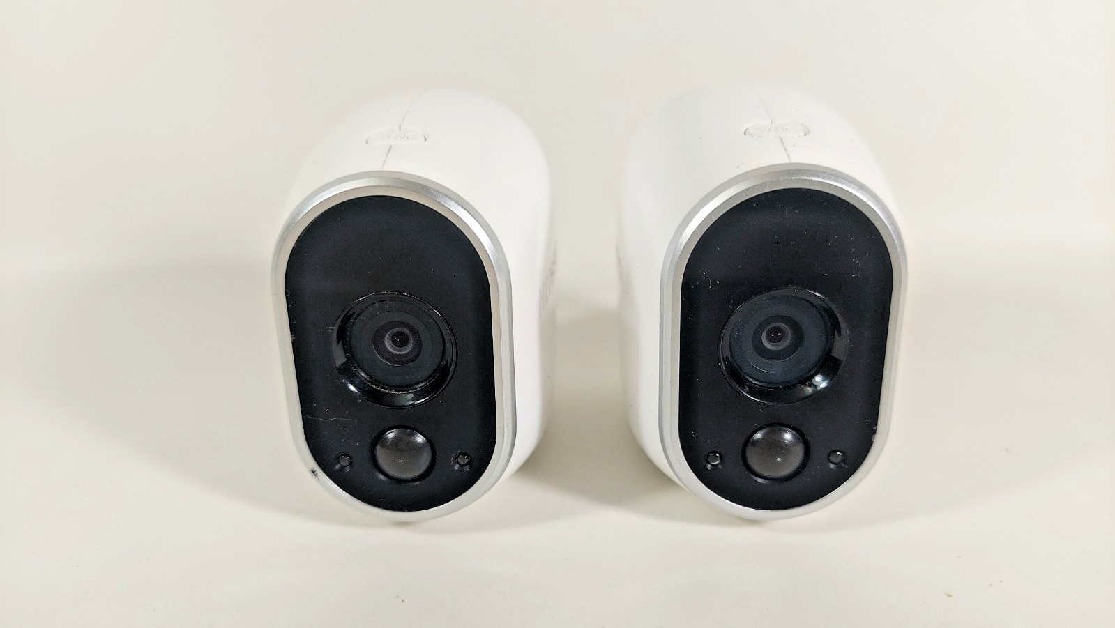 Lot of 2 Netgear Arlo VMC3030 Wireless Security Cameras with Base and batteries