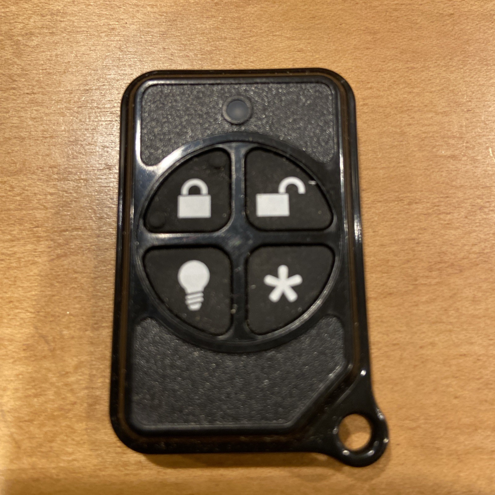 New GE Interlogix 600-1064-95R Four Button Wireless Remote Key-fob with Battery
